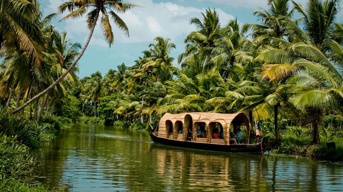 Longtail boat on tropical island beach